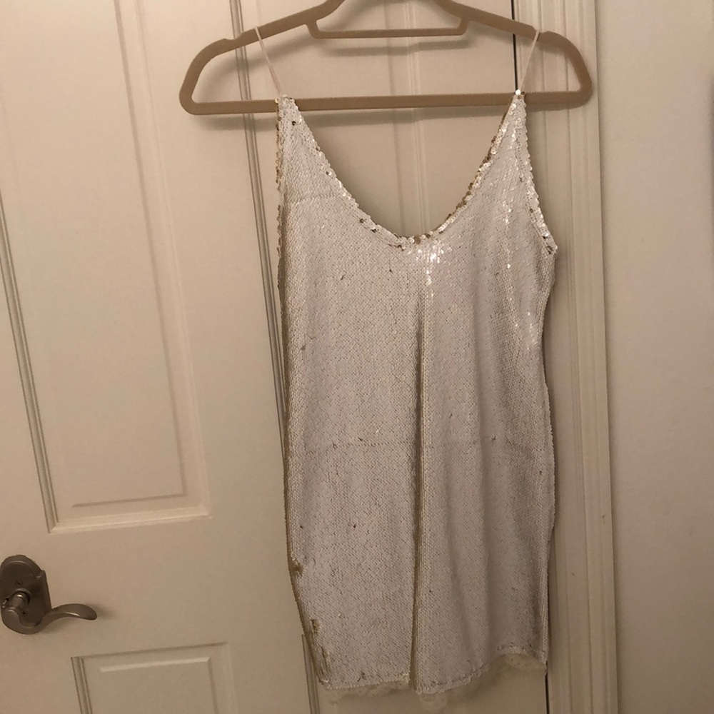 White and gold sparkly mini dress